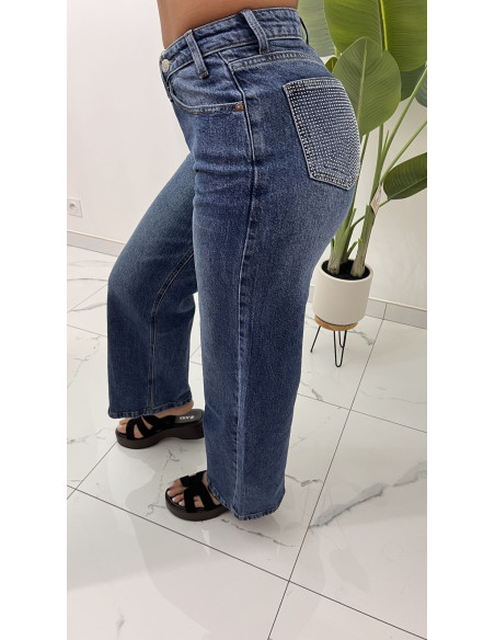 Jeans bleu asymétrique poches strass